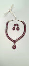 Gold Plated Sleek Necklace Set With Deep Pink Stones.